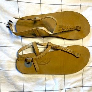 Brown woman’s size 7 rainbow buckle sandals